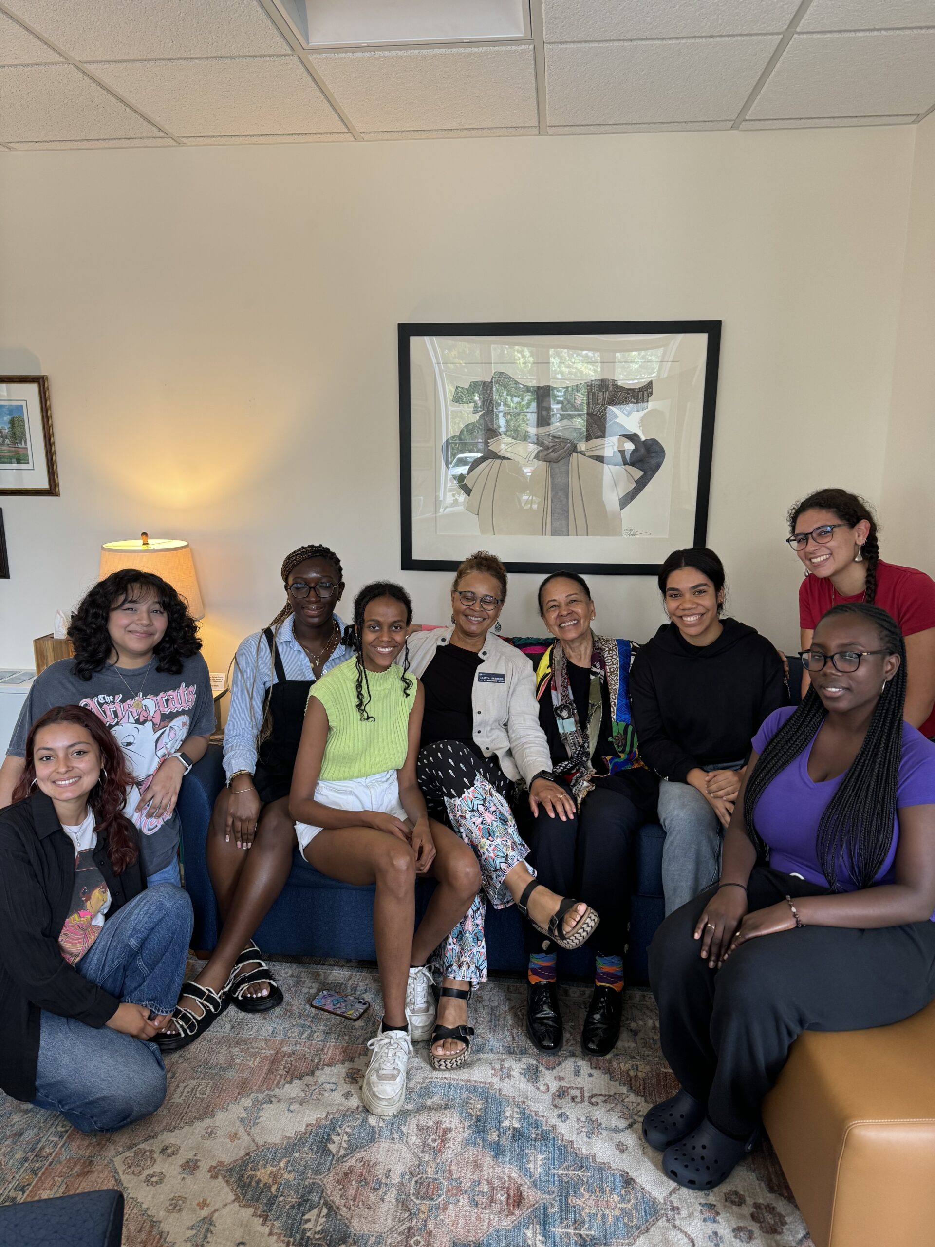 Students and director hosted a special luncheon for me and we talked about BSA and affinity groups - photo is at Mwangi Center posing under art that I donated to BSA